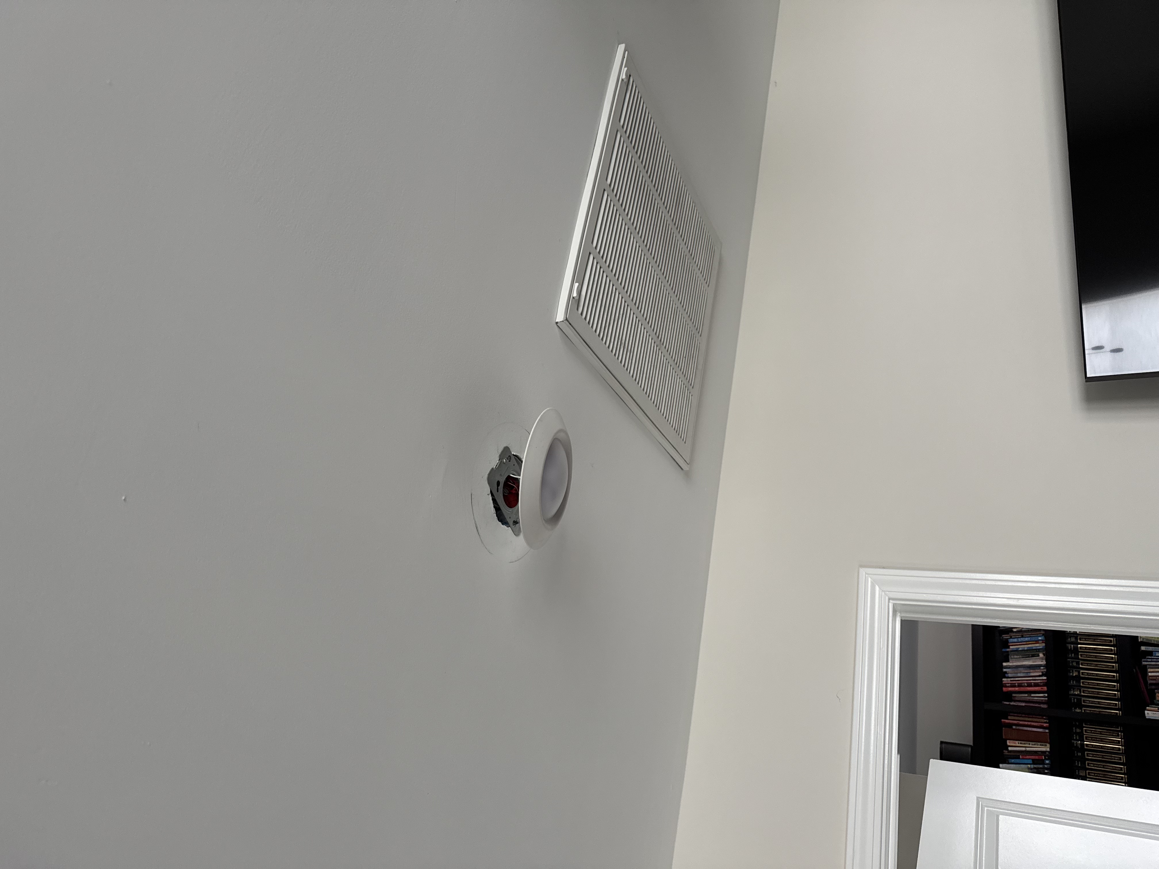 Ceiling light before: exposed/dangling wiring