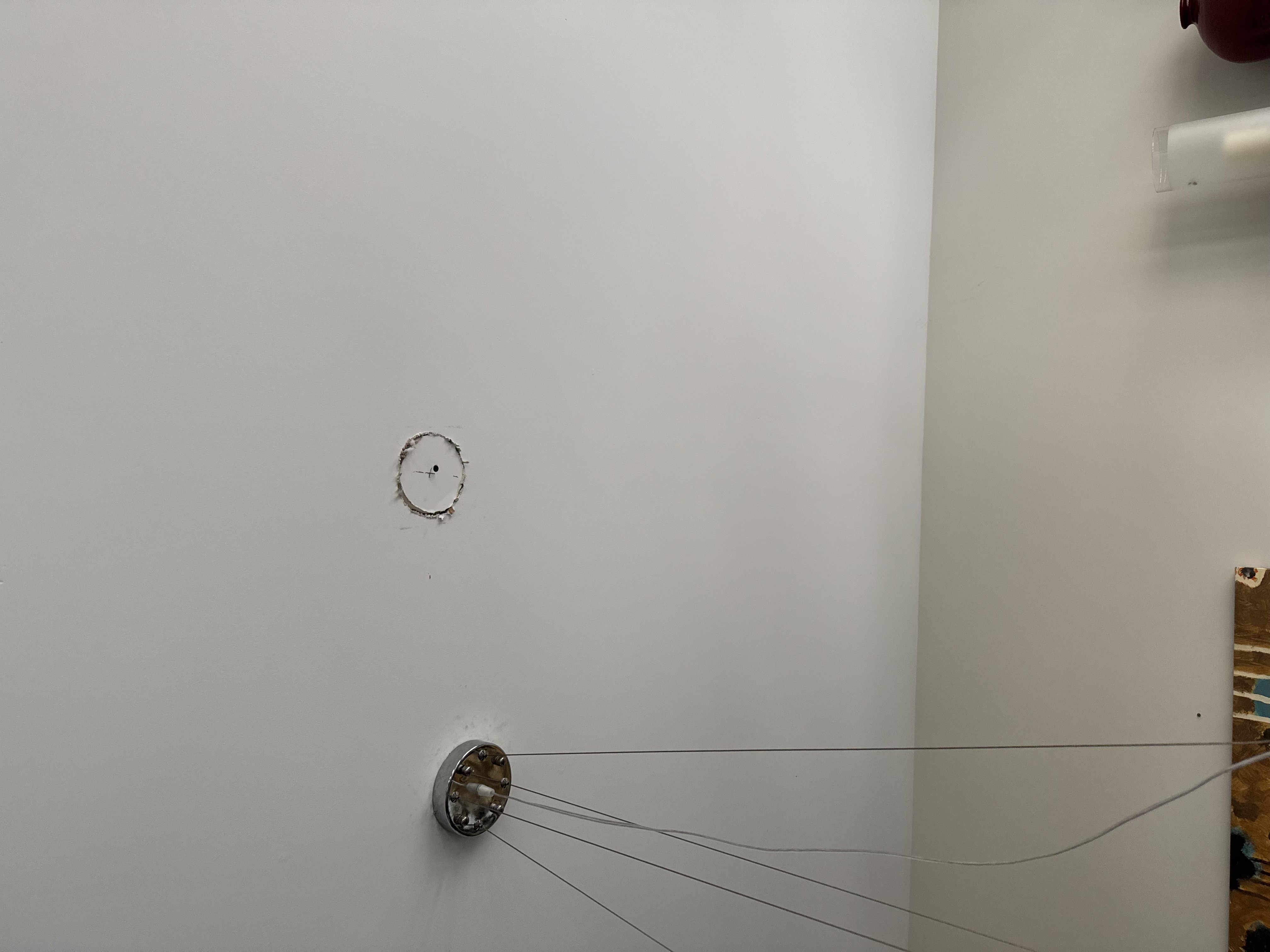 Drywall before: damaged wall area needing patch