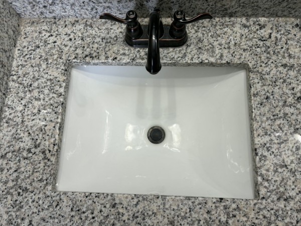 Bathroom vanity after: new basin installed cleanly