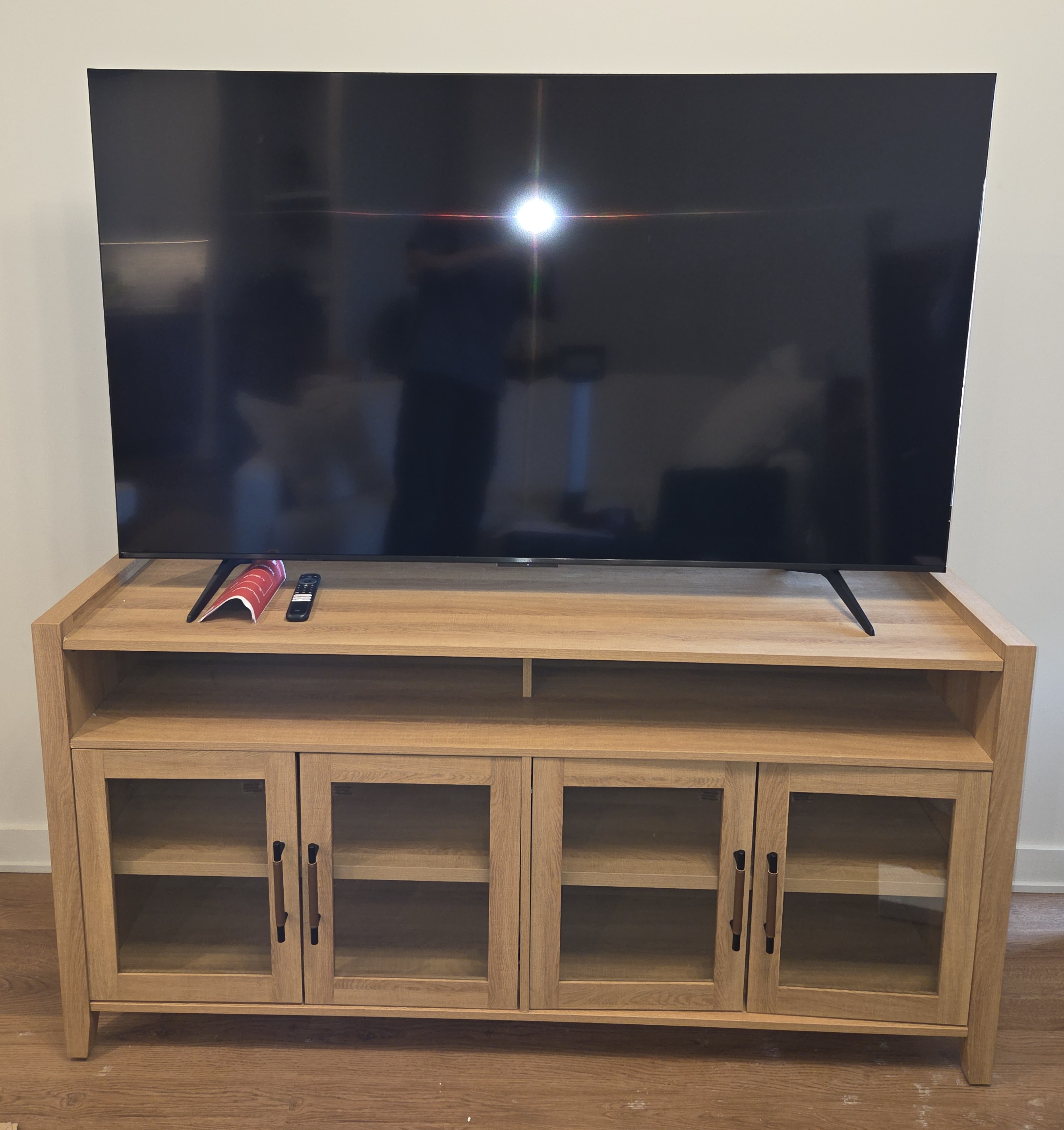 Furniture assembly: TV console assembled and ready for electronics